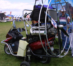 Flite Bike a flying Honda motorcycle and a Buckeye Powered parachute.