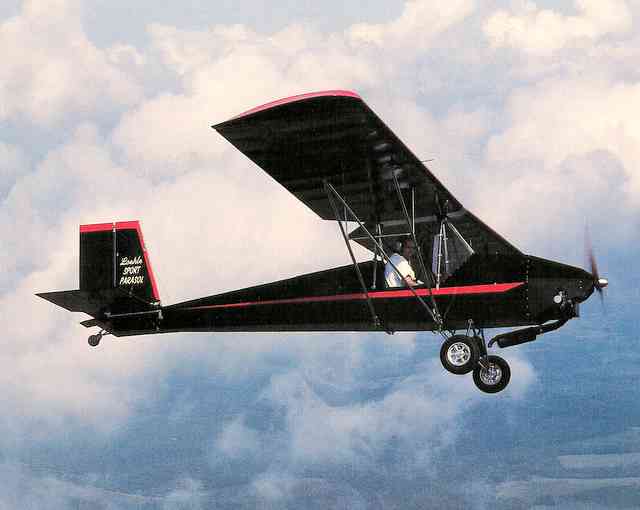 Loehle Sport Parasol flying on a two stroke engine.