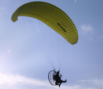 Powered paraglider pilot flying at the EAA Sun N Fun Convention.