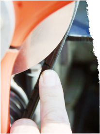 Cracks in drive belts, or a shiny smooth surface are causes for concern.