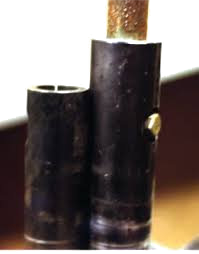 Quicksilver coupler on left failed near shaft retaining bolt.
