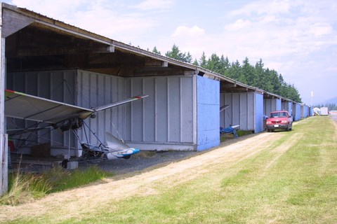 Quicksilver MX single seat ultralight aircraft sitting in a hangar.