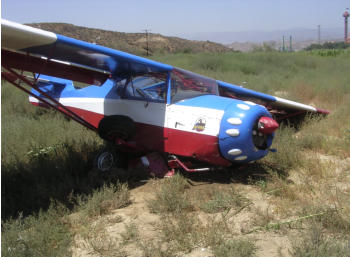 The engine stayed in place and the Kitfox's glide performance was excellent. No injuries to the two occupants and no damage on the ground, but the airplane was totaled. 