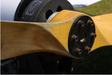 Here you can see a wooden propeller that is suffering from proper care and maintenance.