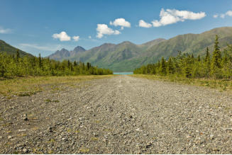 As soon as you do the gravel with be sucked up into the propeller.